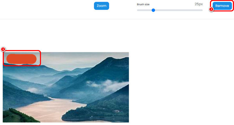 ブラシツールを使って削除（Tinywow）。
